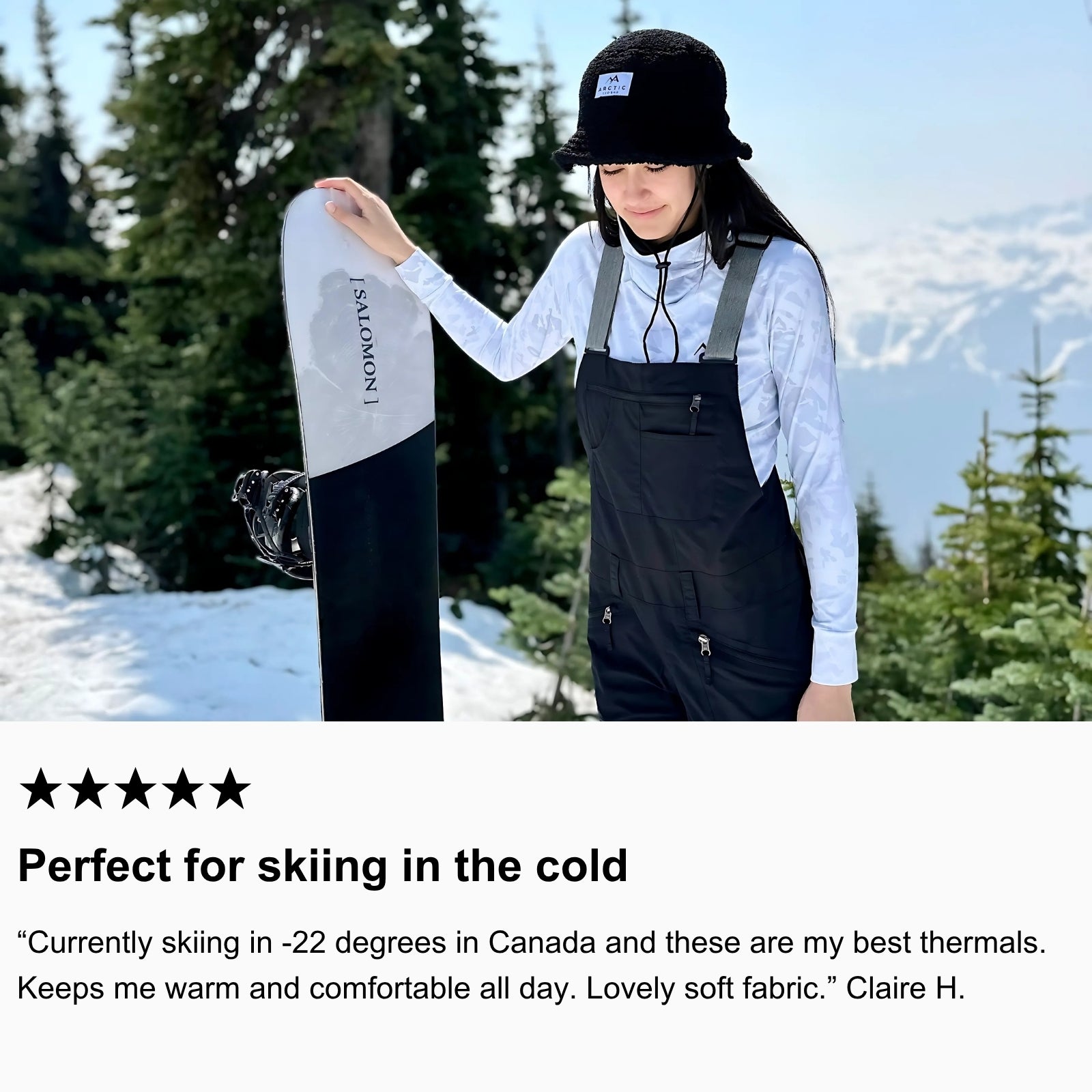 Photo of community member snowboarding in Canada, wearing Arctic Eco-Sno Women’s Base Layer Top and Base Layer Leggings in Sno-Camo.