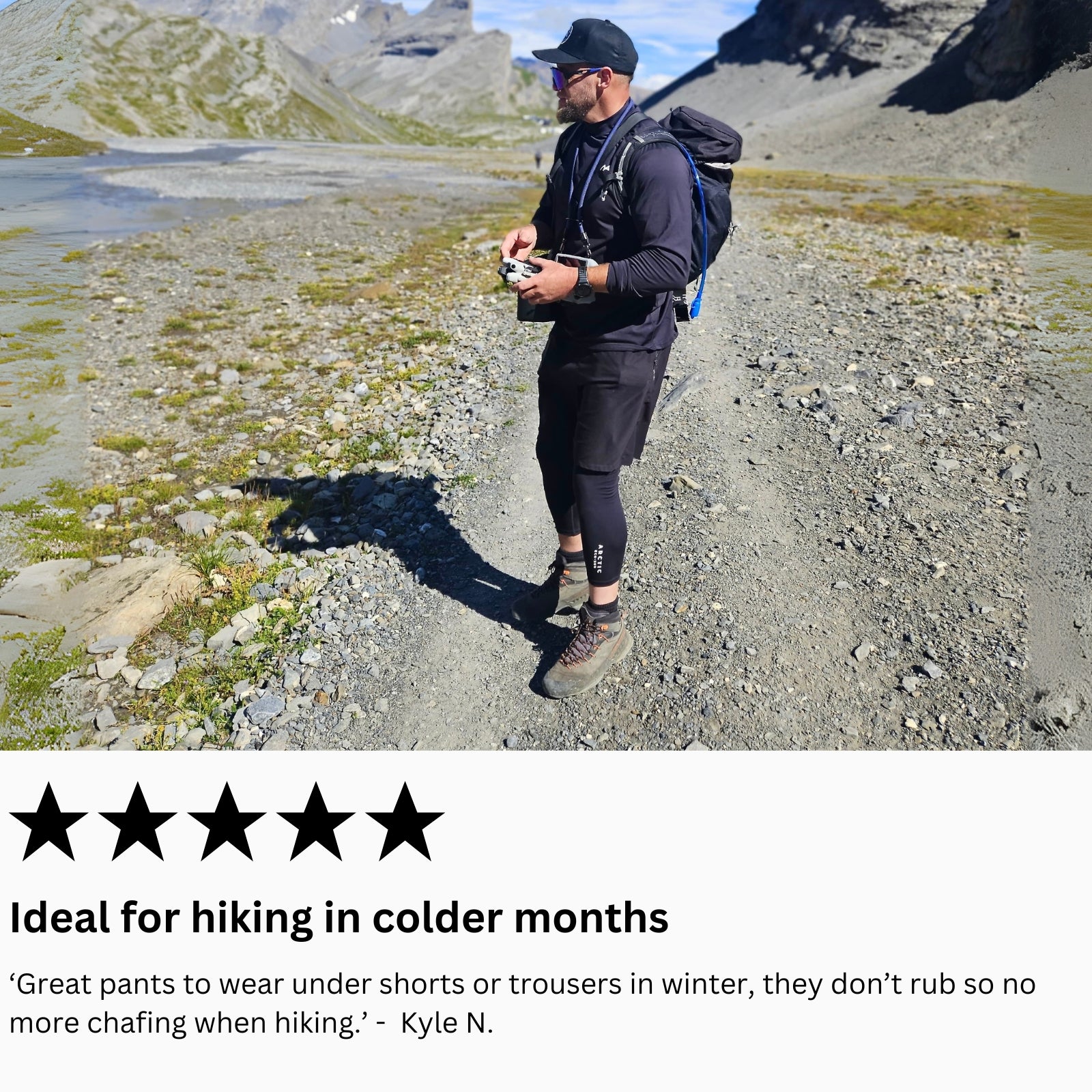 Person hiking in a mountainous area wearing arctic eco sno base layers. 