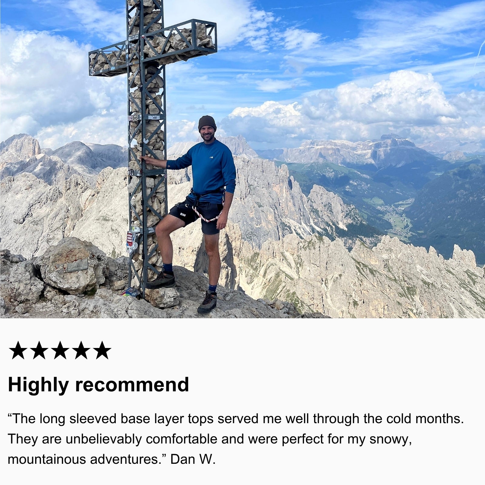 Photo of community member hiking in the Dolomites, Italy wearing Arctic Eco-Sno Men's Base Layer Top in Midnight Blue.