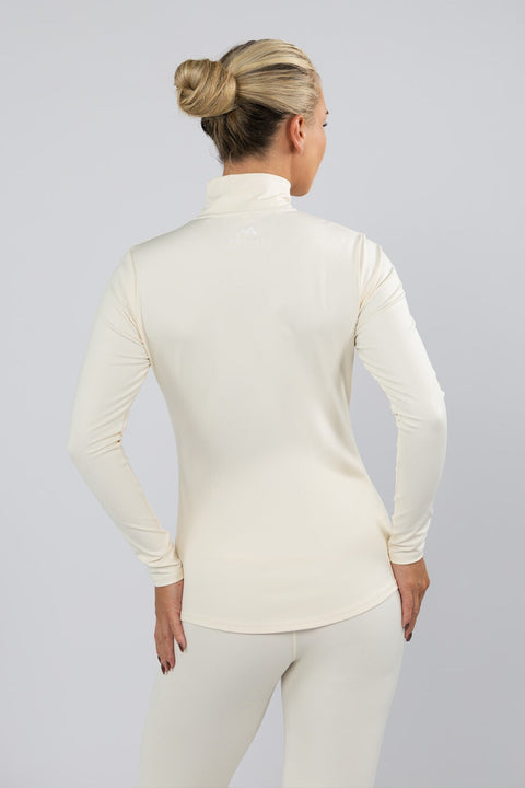Back view of women's Buttercream quarter zip thermal base layer top showing the high collar, fitted shape, curved hem and Arctic Eco-Sno back logo.