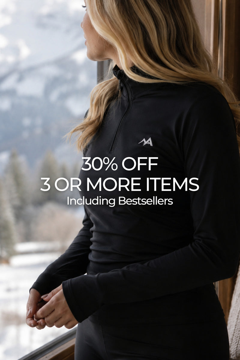 Woman wearing black base layer with text on screen advertising 30% off sale