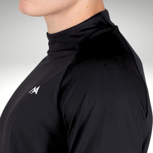 Male model wearing black base layer showing high raised neck feature.