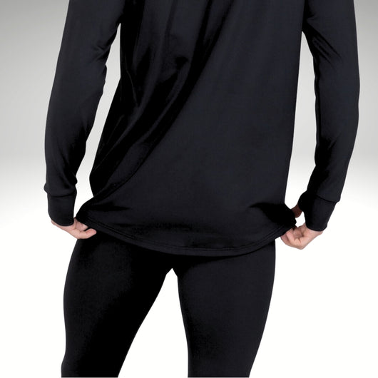 Male model showing curved hem wearing black base layer top.