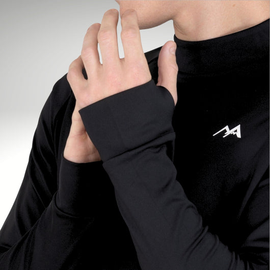 Male model showing thumb holes wearing black base layer top.